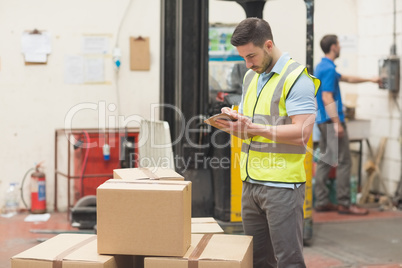 Warehouse worker with clipboard Warehouse worker with clipboard