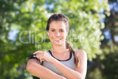 Fit brunette on a run in the park