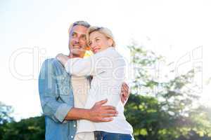 Cute couple hugging at the park