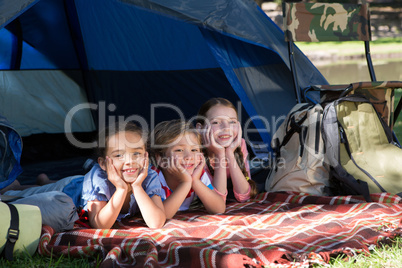 Happy siblings on a camping trip