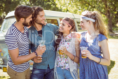 Hipster friends having a beer together