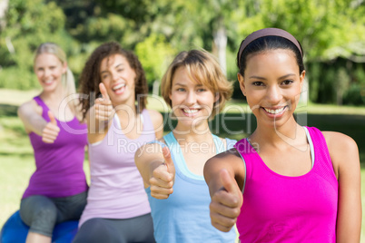 Fitness group sitting on exercise balls