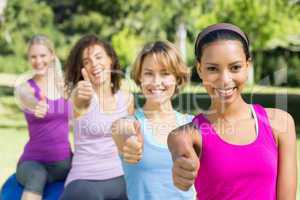 Fitness group sitting on exercise balls