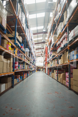 Shelves with boxes in warehouse