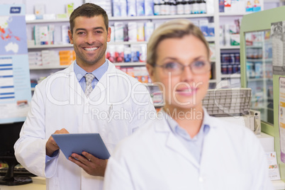 pharmacists looking at camera
