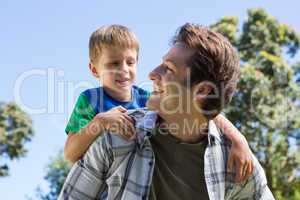 Father and son having fun in the park