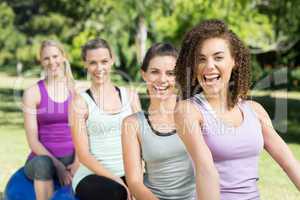 Fitness group sitting on exercise balls