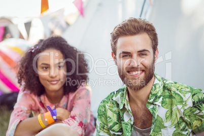 Happy hipsters smiling at camera