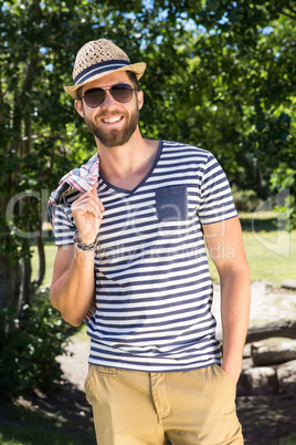 Handsome hipster smiling at camera Handsome hipster smiling at camera