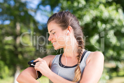 Fit brunette on a run in the park