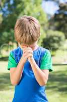 Little boy saying his prayers