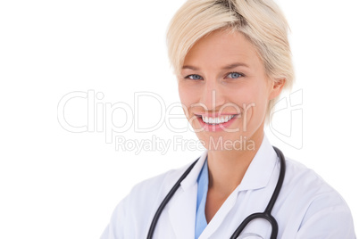 Blonde doctor smiling at camera