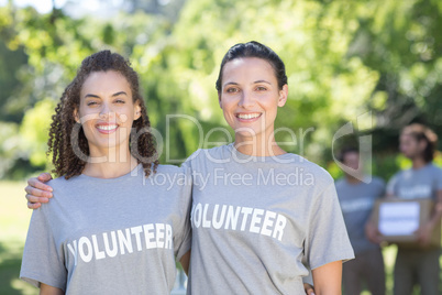 Happy volunteers in the park