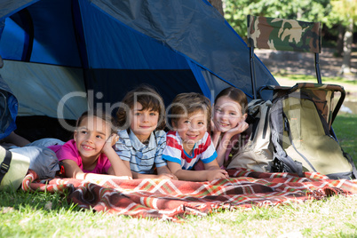 Happy siblings on a camping trip