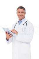 Happy doctor using tablet pc