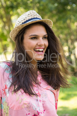 Pretty brunette smiling in park