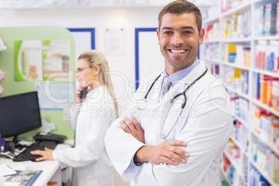 Pharmacist smiling with Pharmacist on the phone