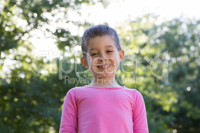 Happy little girl smiling at camera