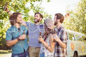 Hipster friends having a beer together