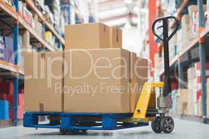 Boxes on trolley in warehouse