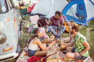 Hipsters having fun in their campsite