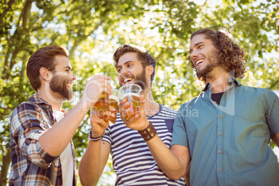 Hipster friends having a beer together