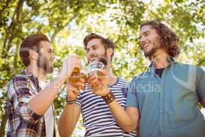 Hipster friends having a beer together