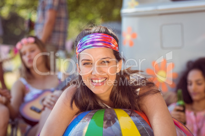 Happy hipsters having fun on campsite