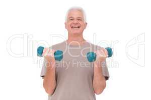 Senior man lifting hand weights