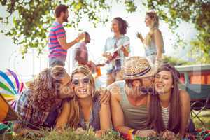 Happy hipster couples on campsite