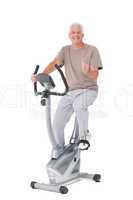 Senior man on exercise bike