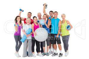 Happy people with exercise equipment