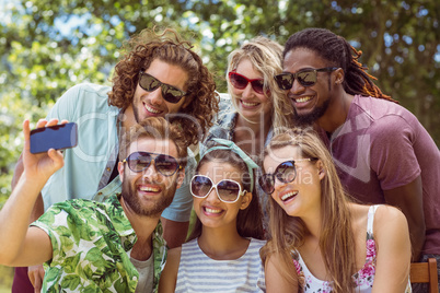 Happy friends taking a selfie