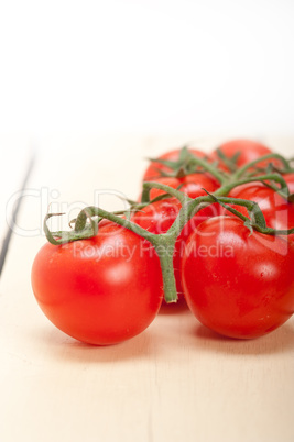 fresh cherry tomatoes on a cluster