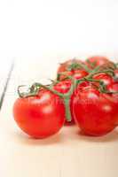 fresh cherry tomatoes on a cluster