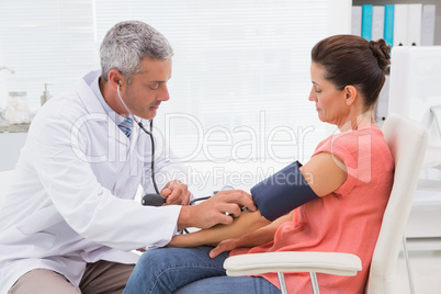 Doctor doing test at his patient