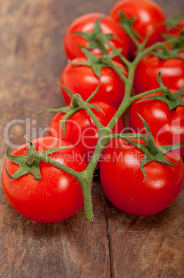 fresh cherry tomatoes on a cluster