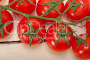 fresh cherry tomatoes on a cluster