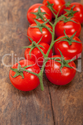 fresh cherry tomatoes on a cluster