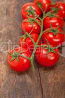 fresh cherry tomatoes on a cluster