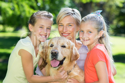 Happy family with their dog