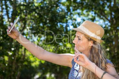 Pretty blonde taking a selfie