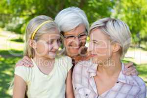 Happy blonde with her daughter and grandmother