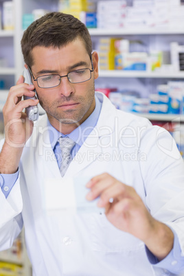 Serious pharmacist on the phone