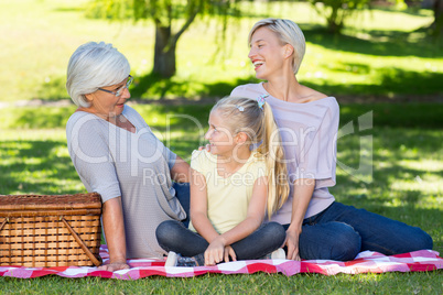 Happy blonde with her daughter and mother