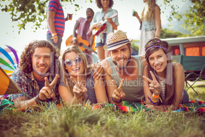 Happy hipster couples on campsite