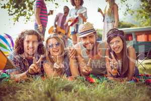 Happy hipster couples on campsite