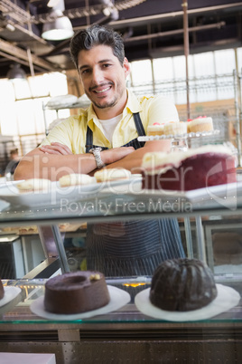 Handsome worker posing on the counter