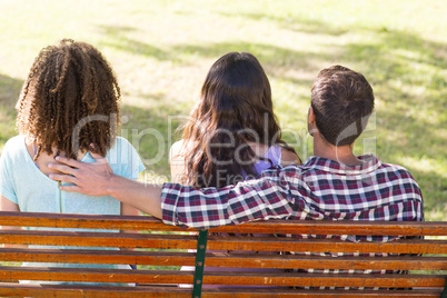 Man being unfaithful in the park