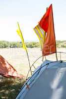 Flags on tents at festival site